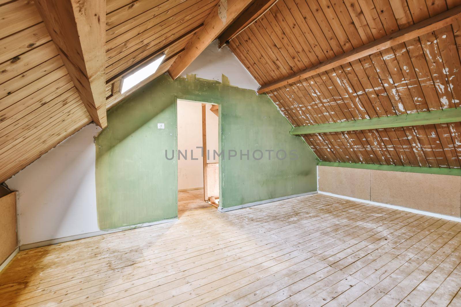Nice and quirky attic room with wooden ceiling