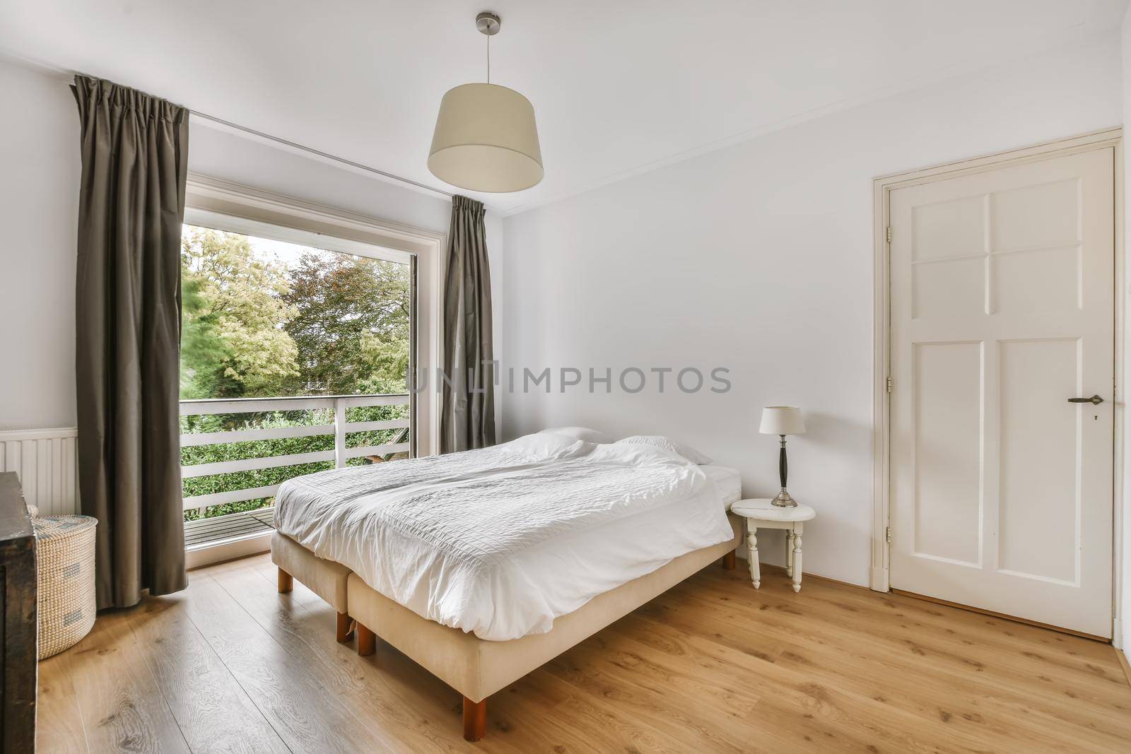 Beautiful bedroom in new luxury home with large bed