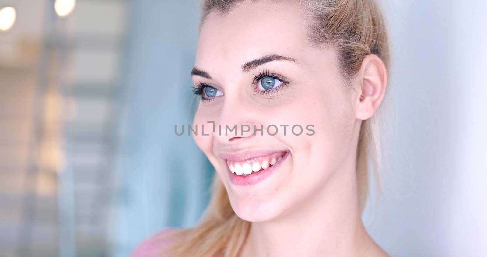 close-up portrait of a beautiful young blond woman