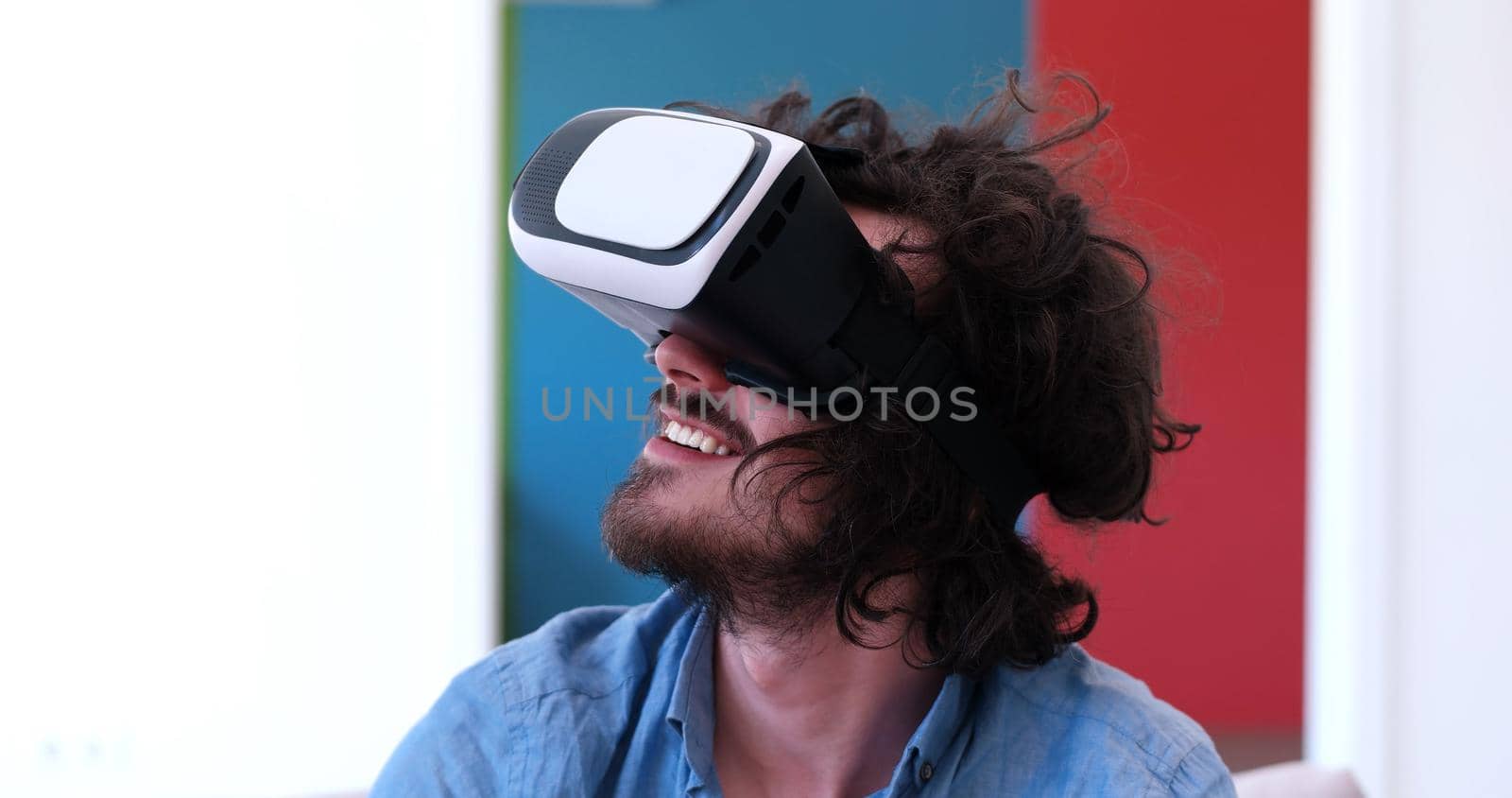 man using VR-headset glasses of virtual reality by dotshock