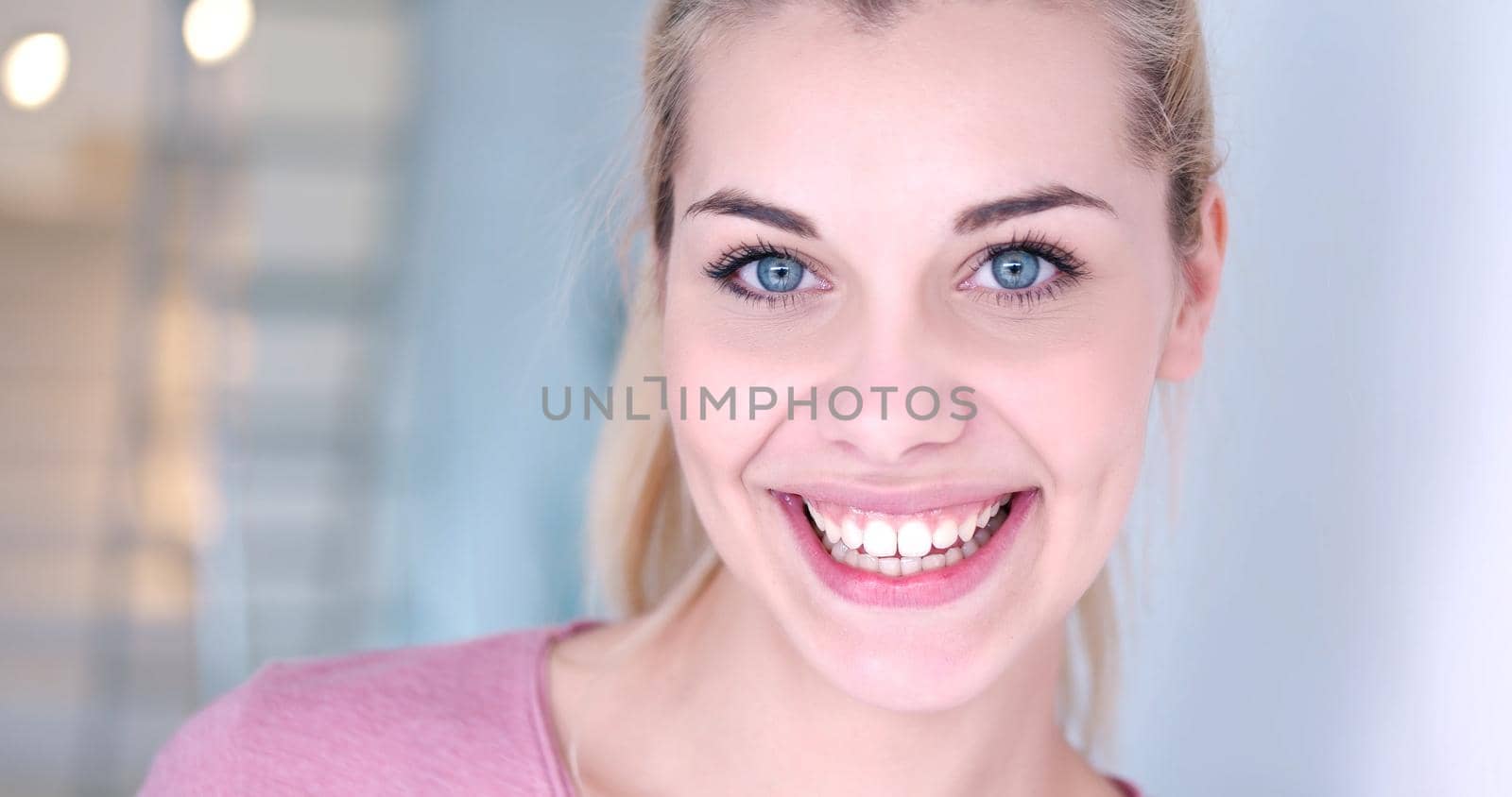 close-up portrait of a beautiful young blond woman