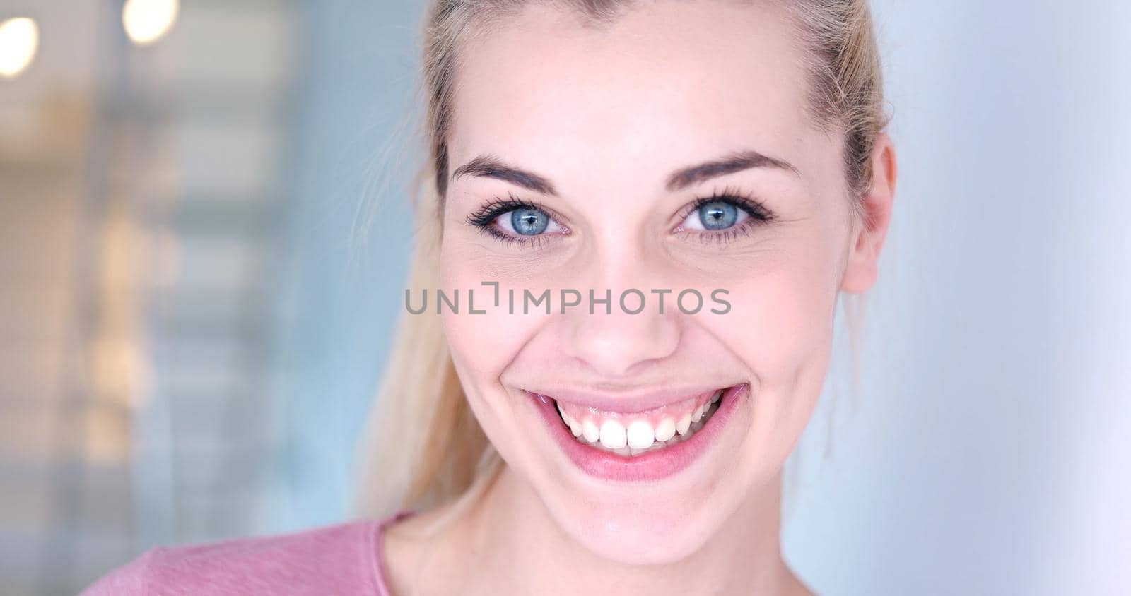 close-up portrait of a beautiful young blond woman