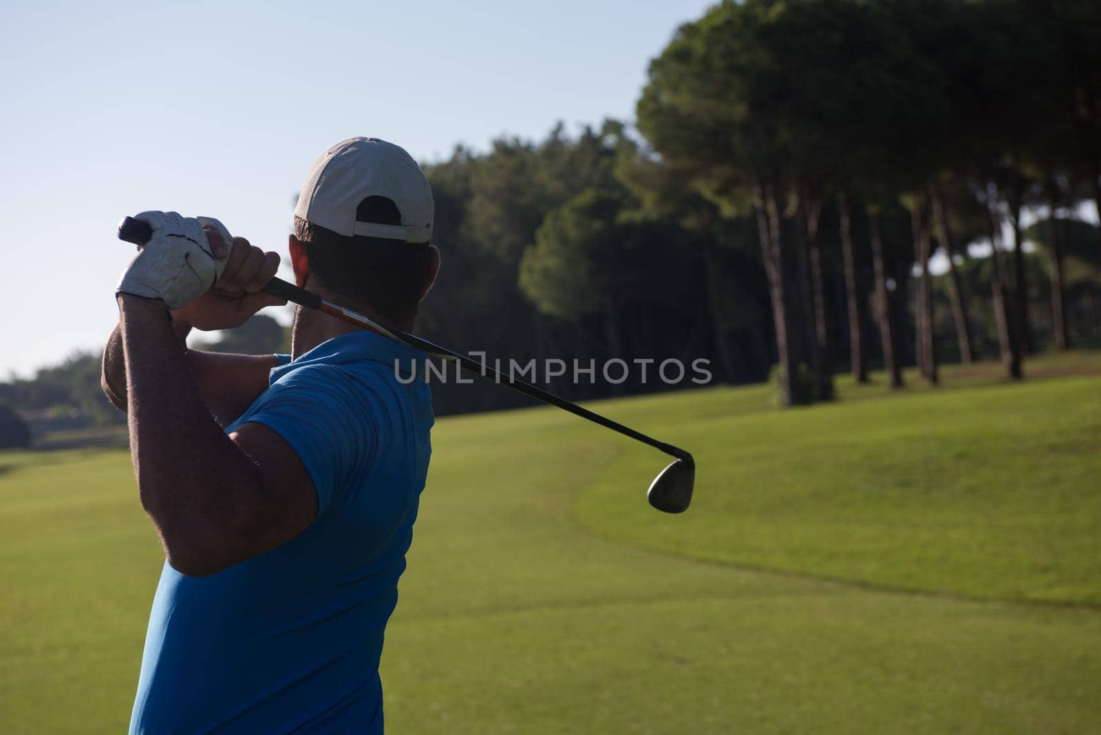 golf player hitting shot by dotshock