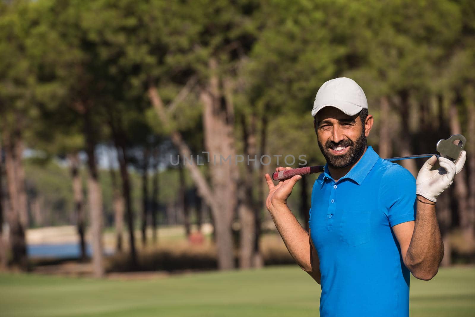 golf player portrait at course by dotshock