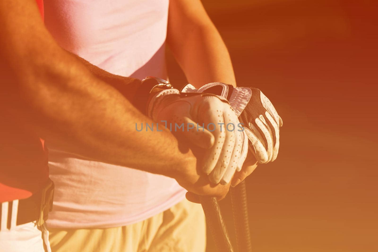 portrait of happy young  couple on golf course