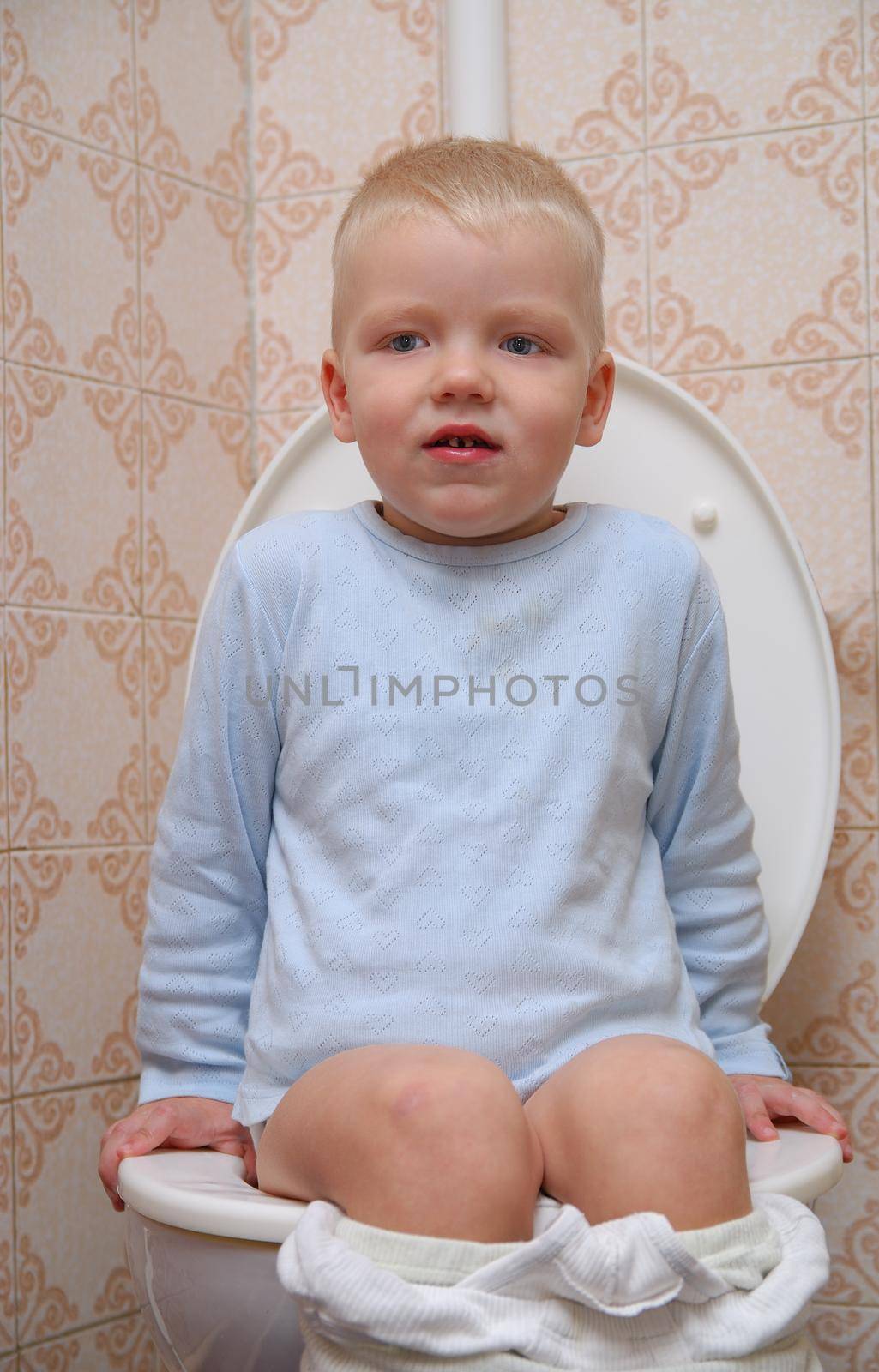 child on toilette