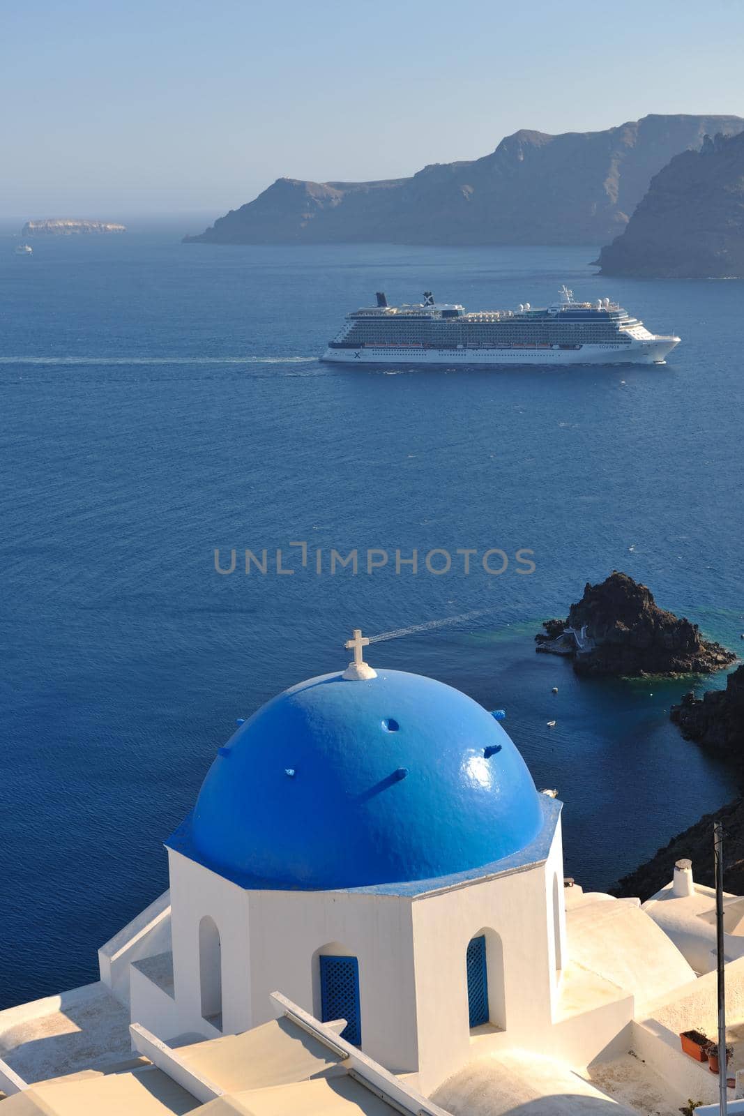 summer vacation on beautiful vulcanic island santorini at greece