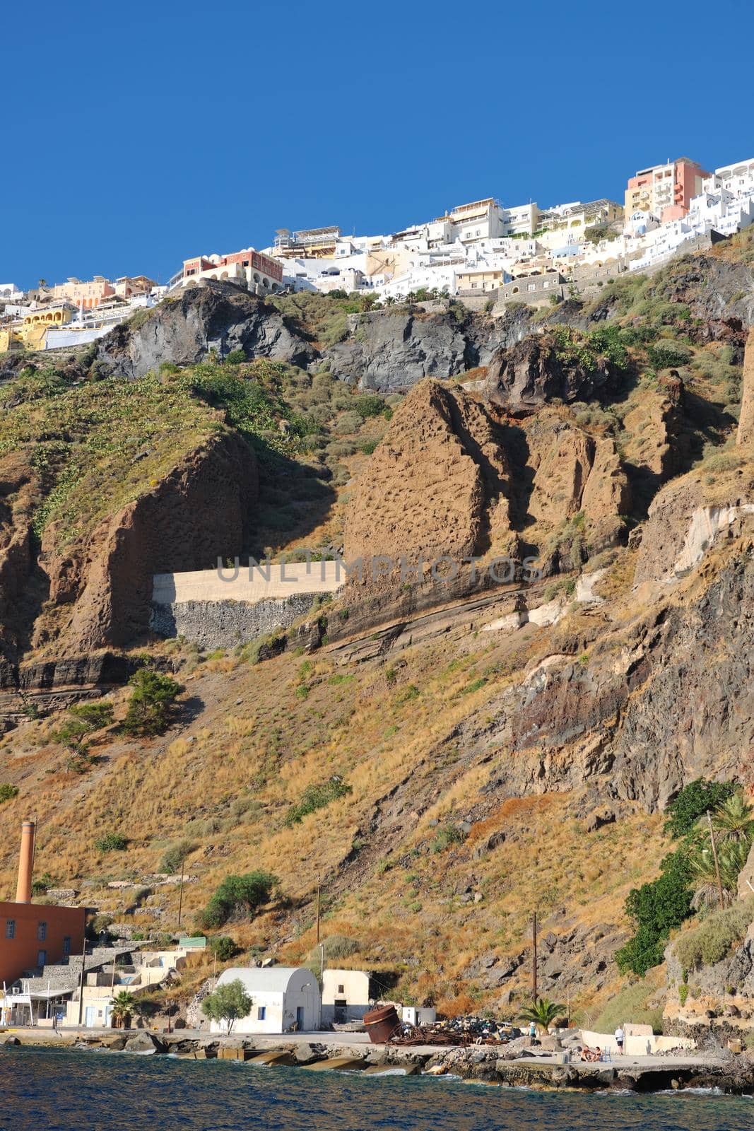 summer vacation on beautiful vulcanic island santorini at greece