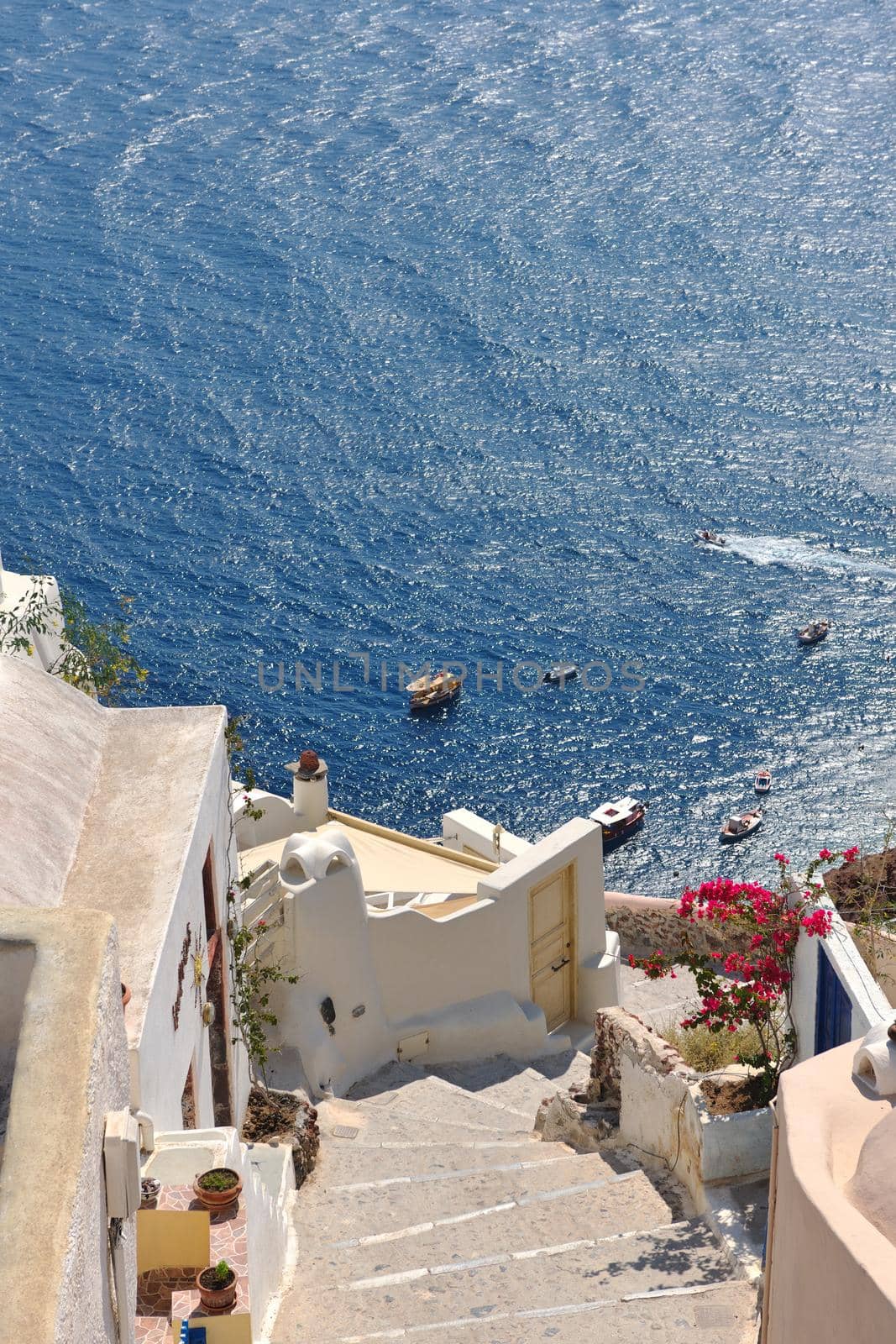 summer vacation on beautiful vulcanic island santorini at greece