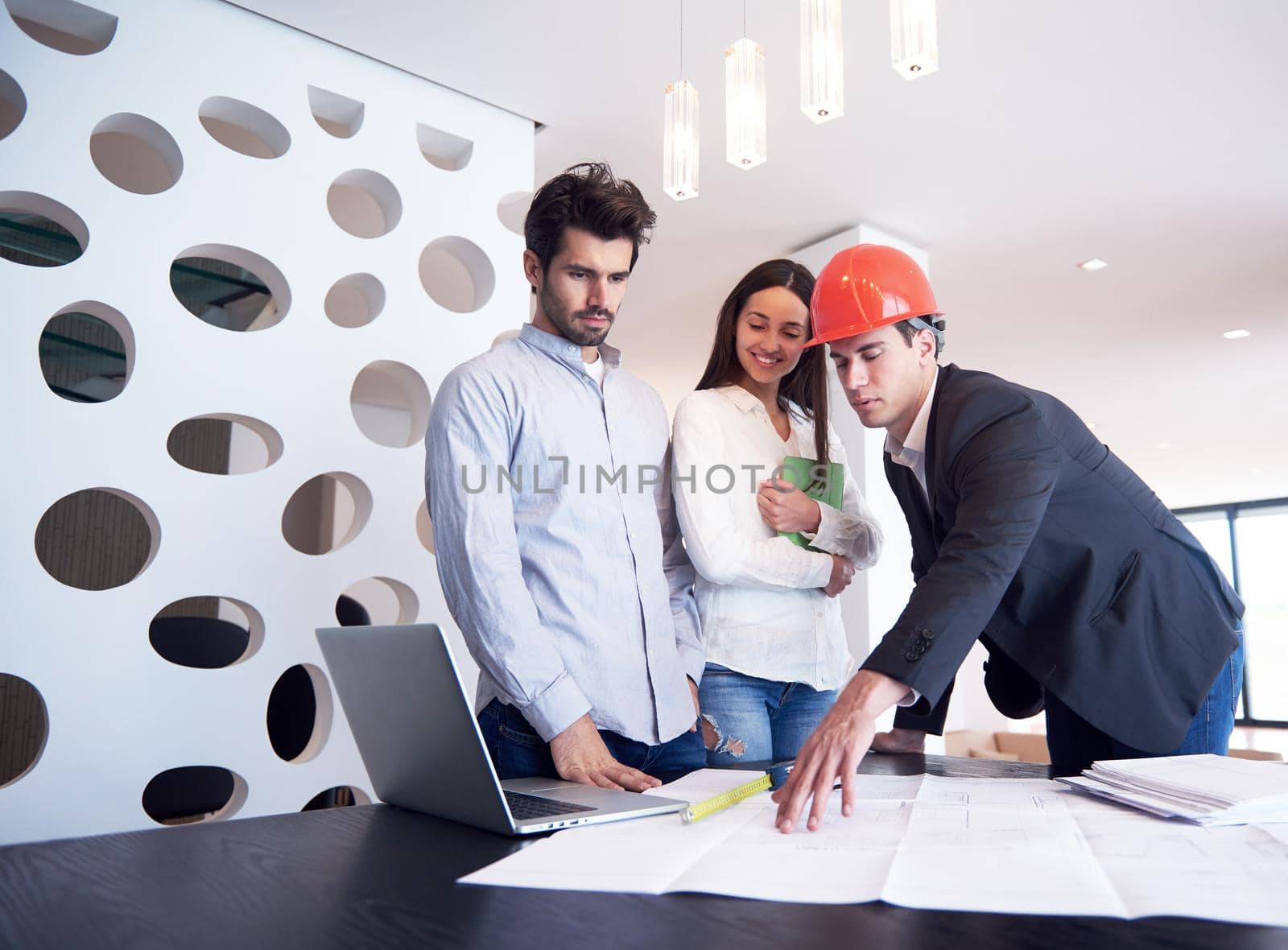 happy young family,  couple buying new home with real estate agent, people group interior