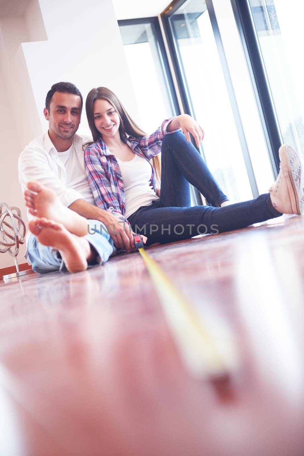 happy young romantic couple at new modern  home interior renovation