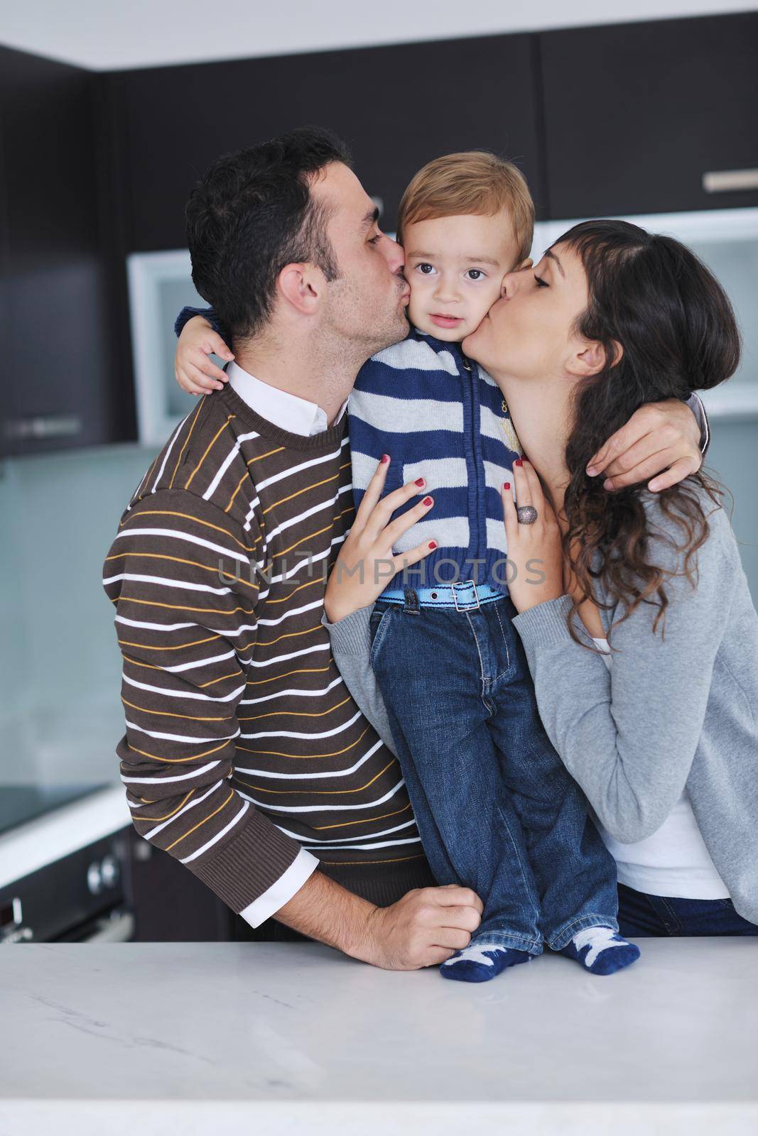 happy young family have fun and relaxing at new home with bright furniture