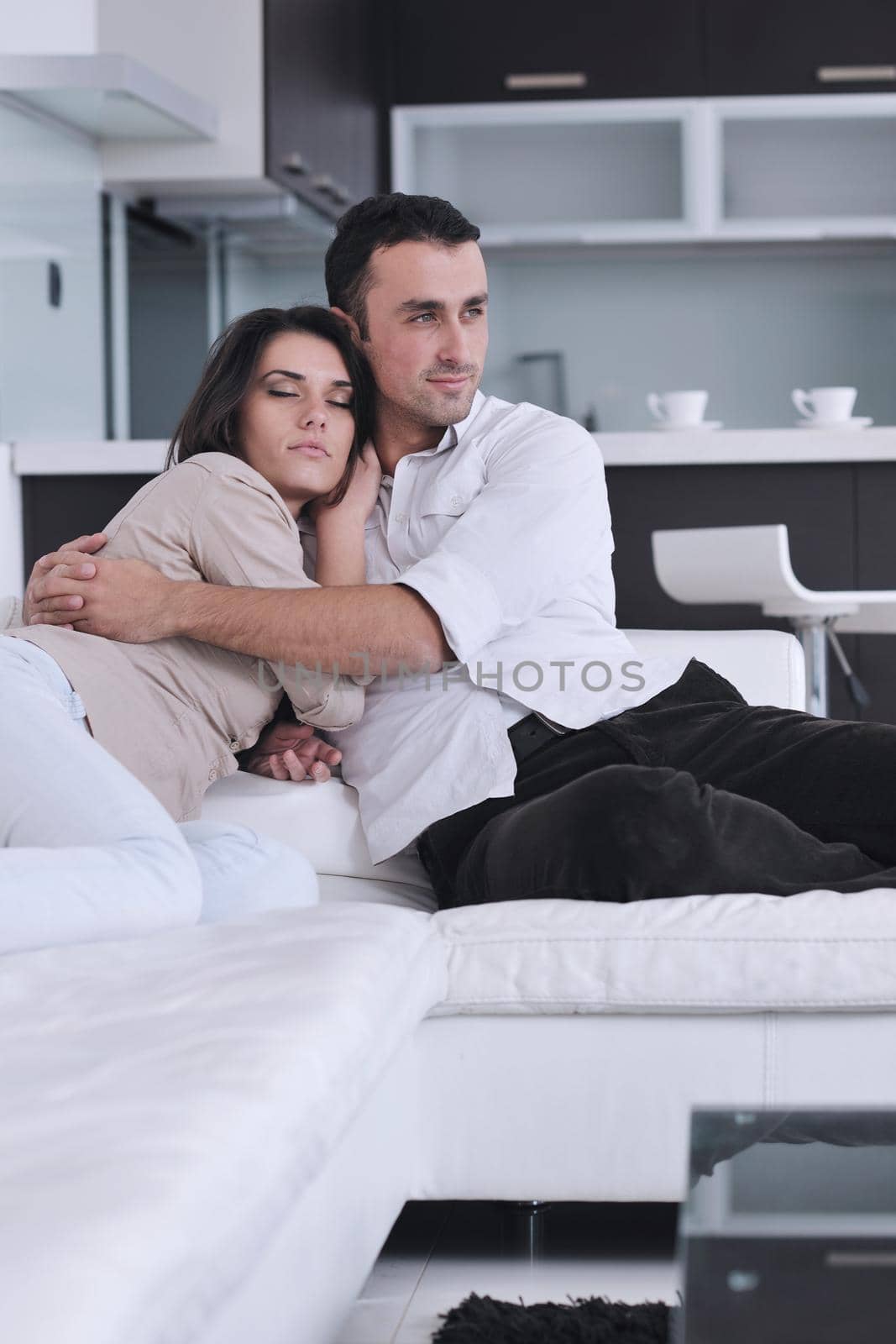 happy young couple relax at modern home living room indoor