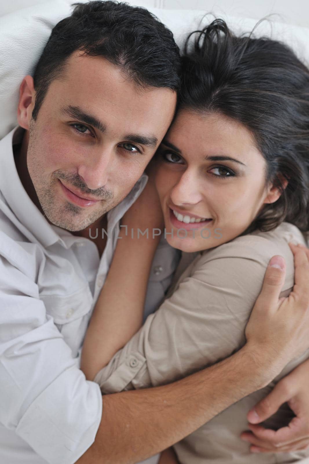 happy young couple relax at modern home living room indoor