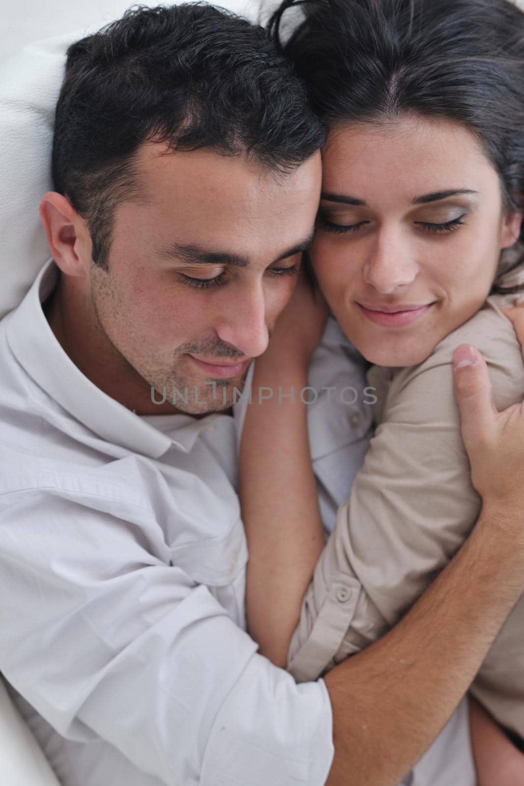 happy young couple relax at modern home living room indoor