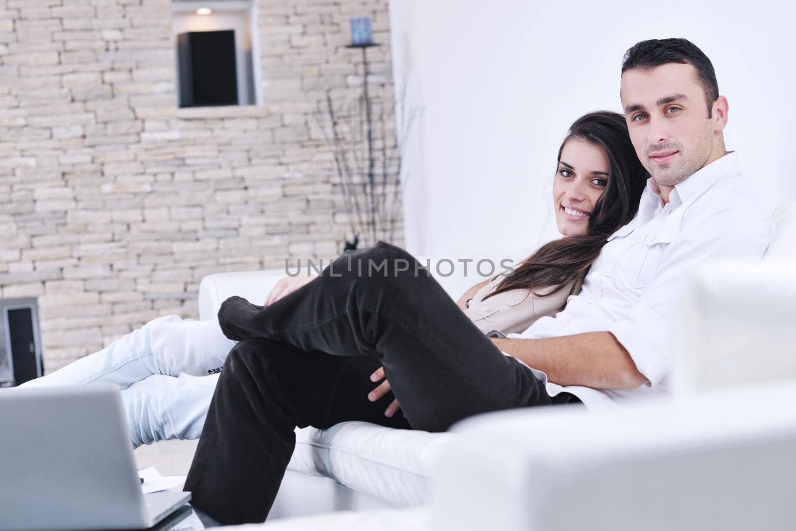 happy young couple relax at home by dotshock