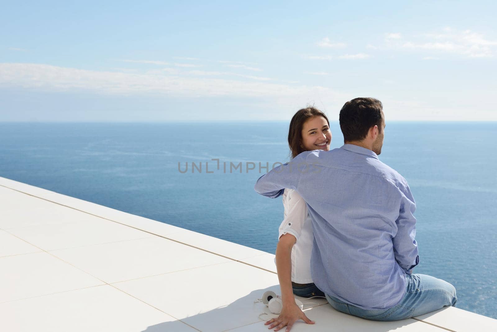 romantic happy young couple relax at modern home outdoors