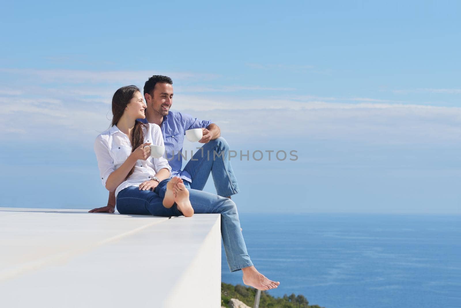 happy young romantic couple have fun relax by dotshock