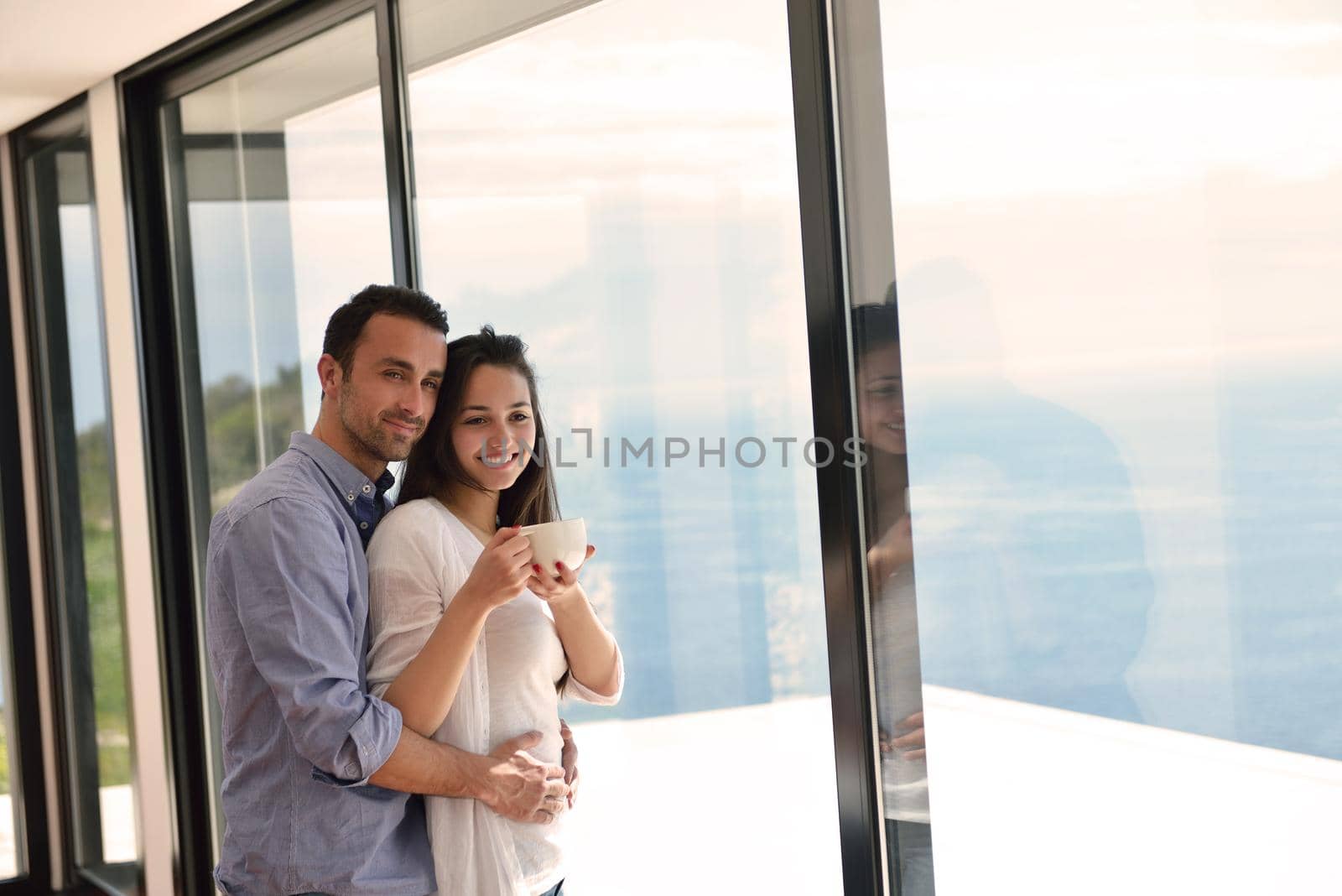 romantic happy young couple relax at modern home indoors