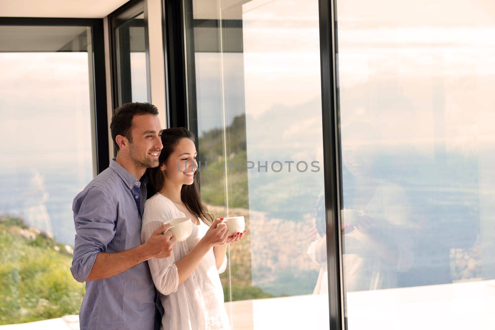 romantic happy young couple relax at modern home indoors