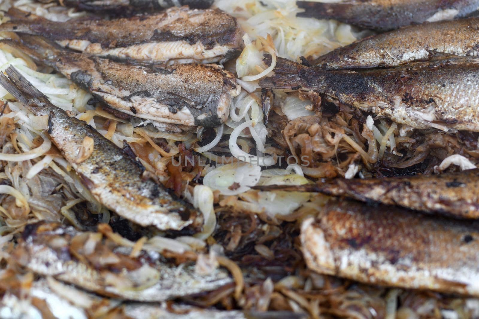 Herring on the grill on a street market