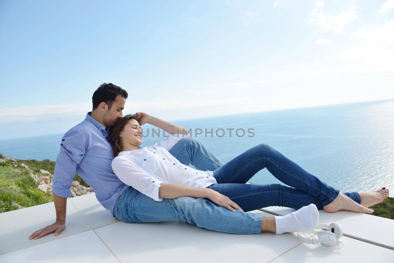 romantic happy young couple relax at modern home outdoors