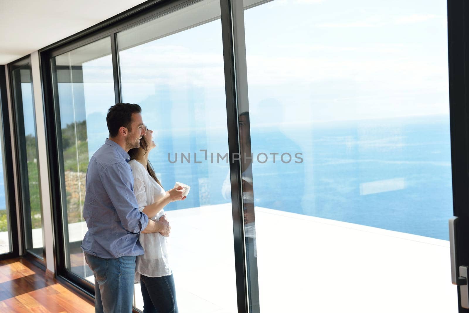 romantic happy young couple relax at modern home indoors