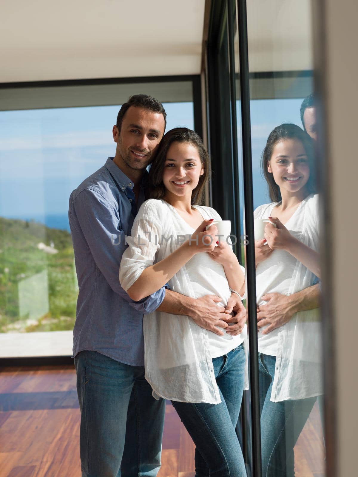 romantic happy young couple relax at modern home indoors