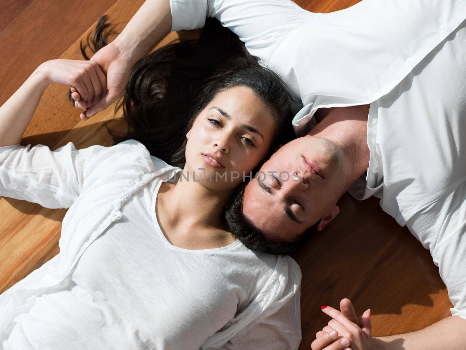 romantic happy young couple relax at modern home indoors