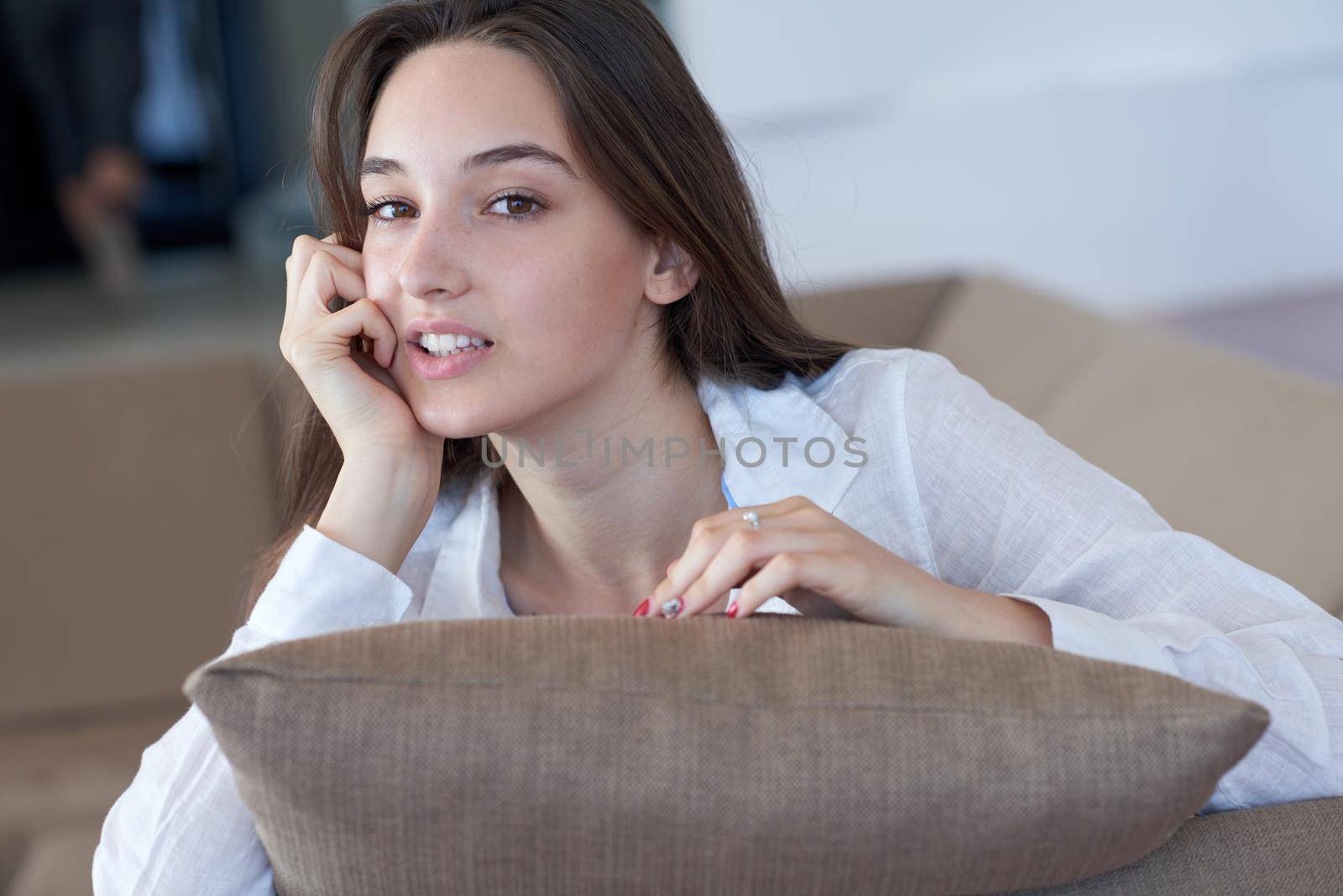 portrait of happy young beautiful woman at home