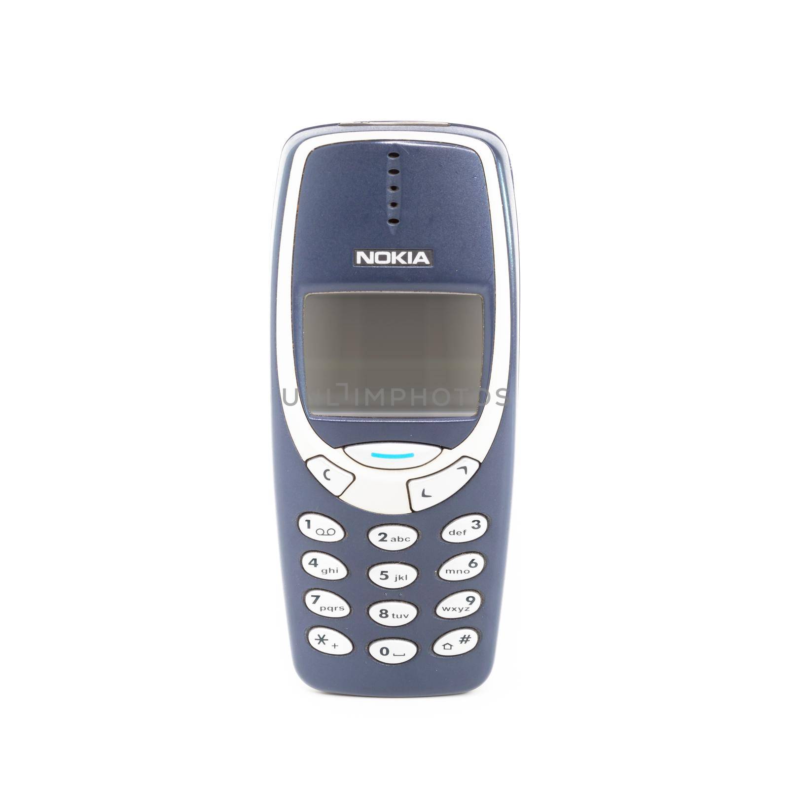 Old mobile phone Nokia 3310 on a white background. Isolated.