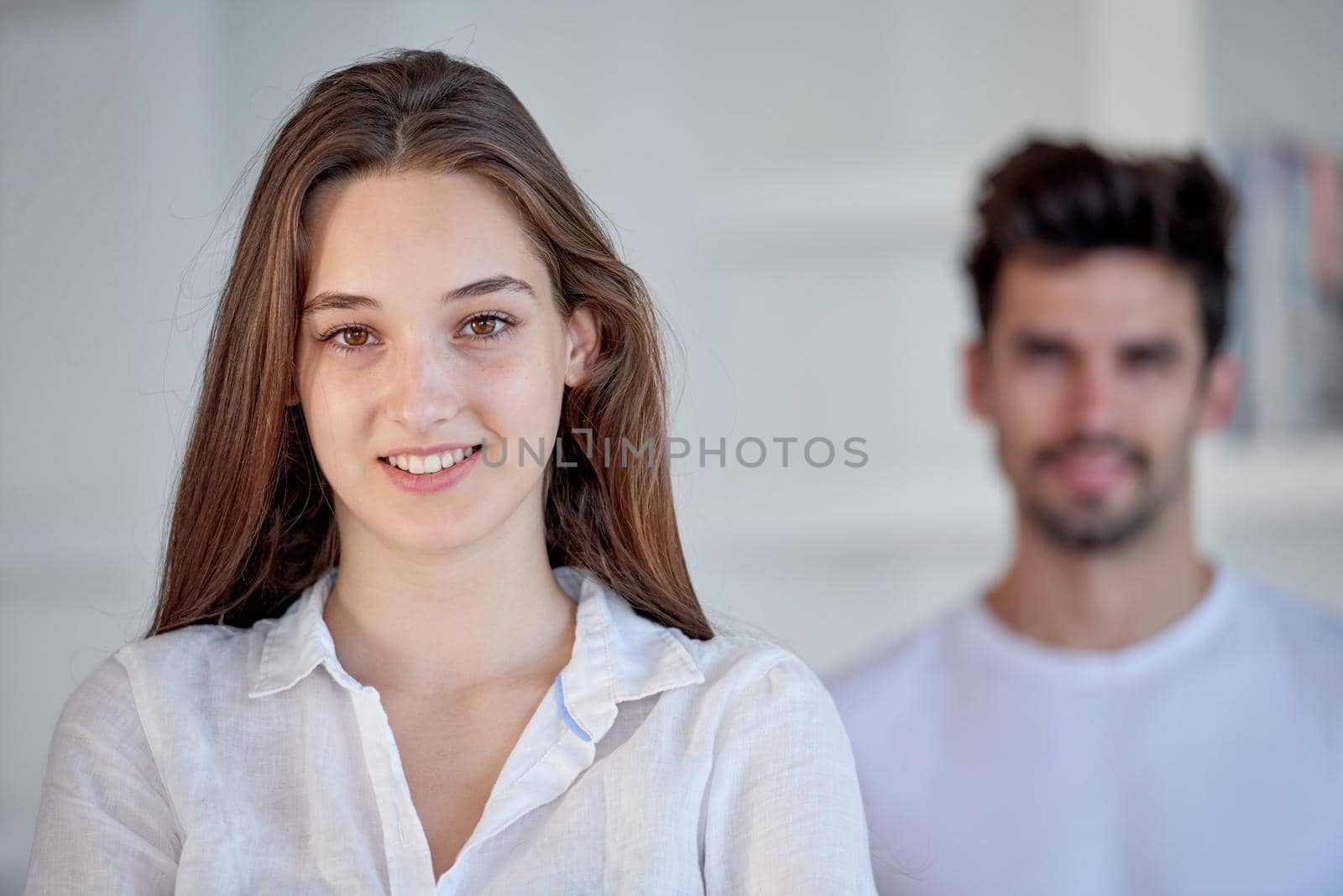 happy young romantic couple have fun relax smile at modern home outdoor terace balcony terace