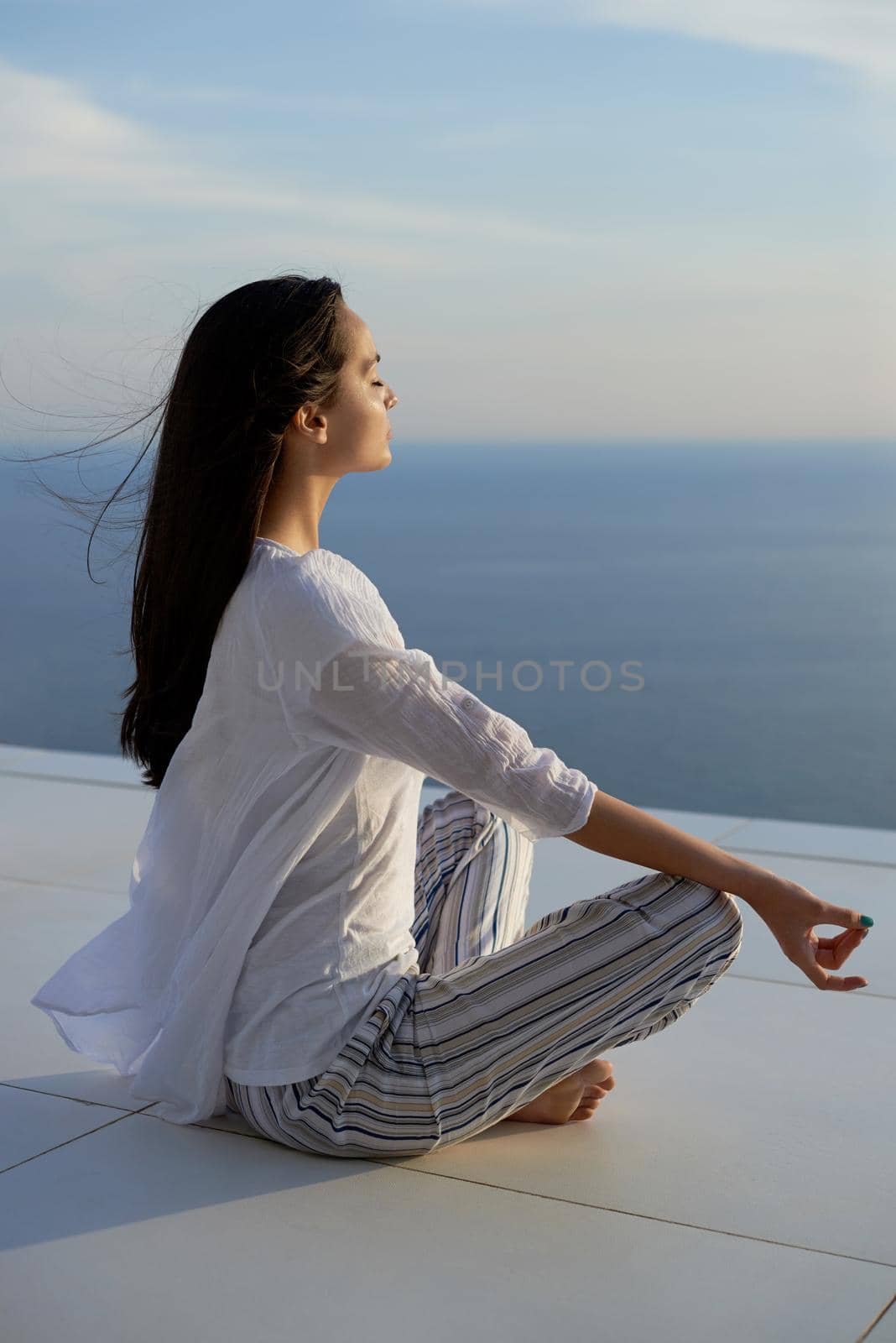 young woman practice yoga by dotshock