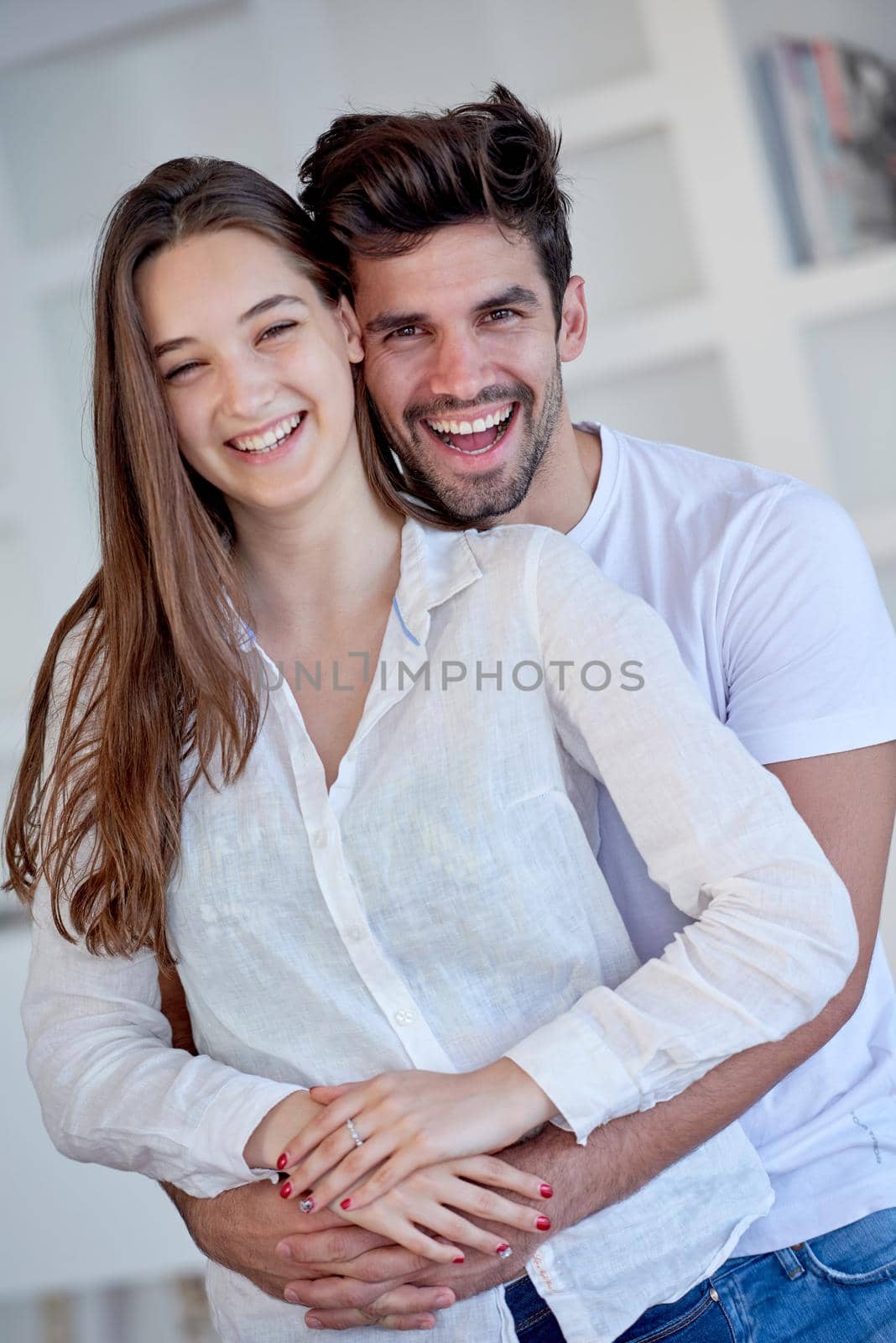 happy young romantic couple have fun arelax  relax at home by dotshock