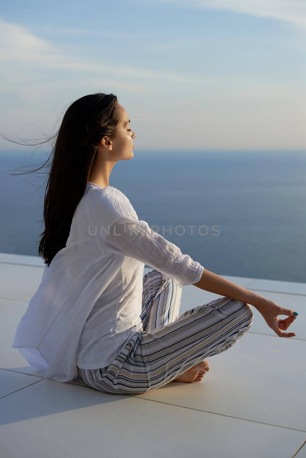 young woman practice yoga by dotshock
