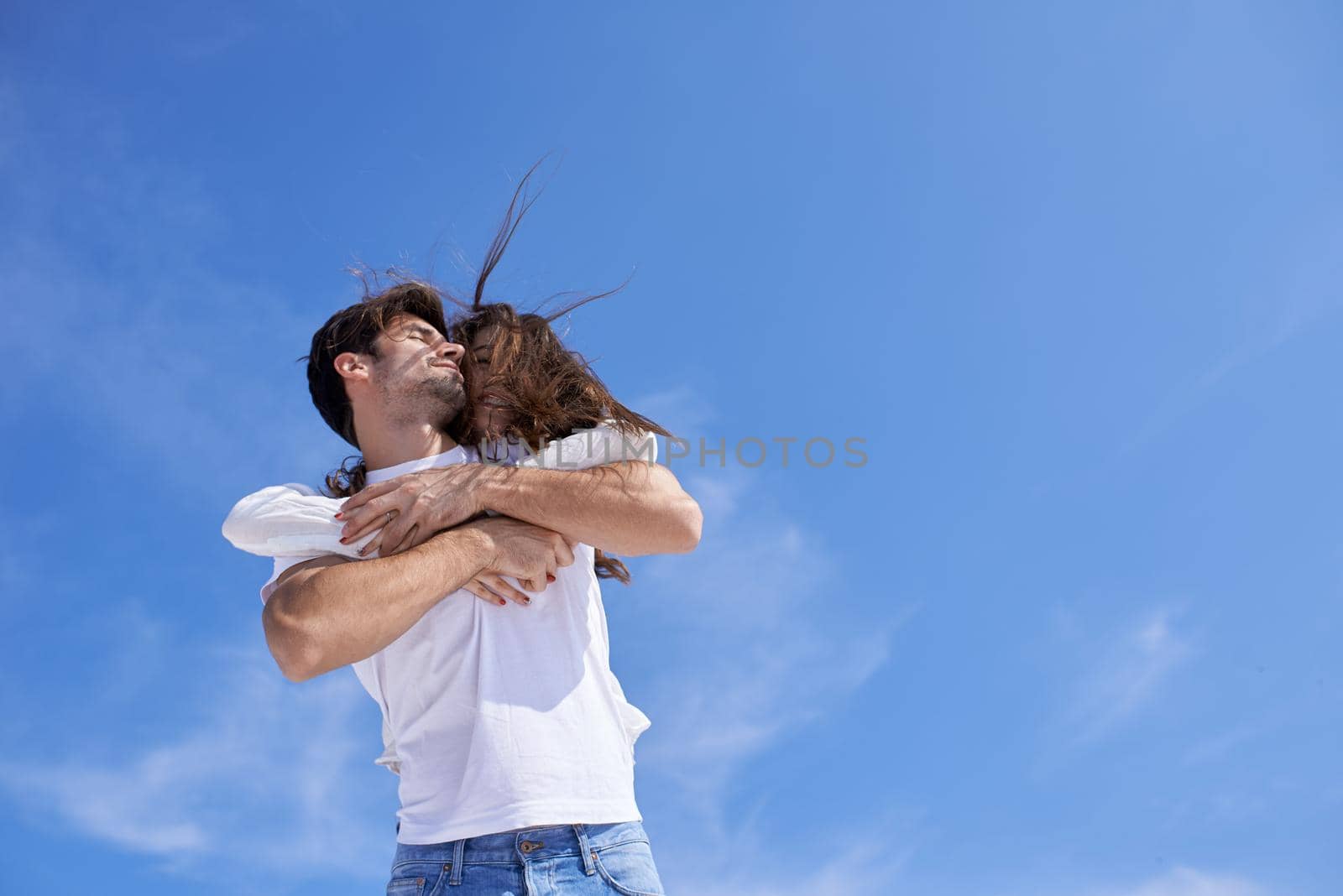 happy young romantic couple have fun arelax  relax at home by dotshock