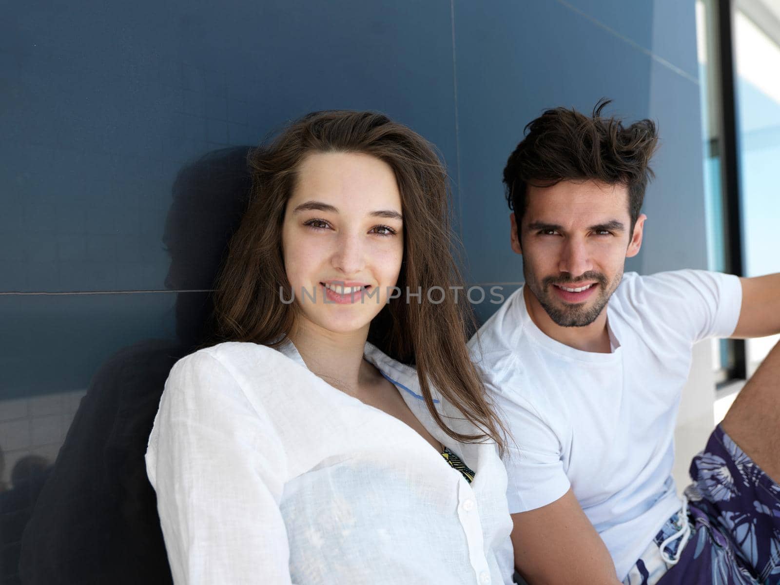 young couple making selfie together at home by dotshock
