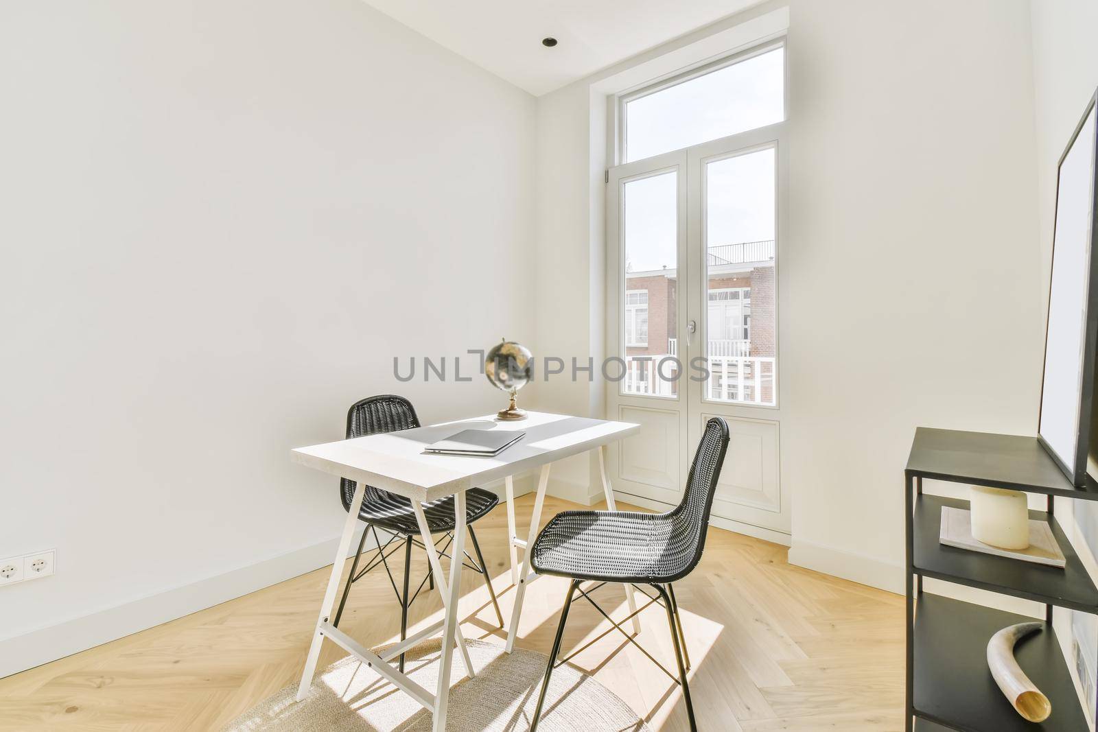 A cozy and spacious office room in a luxury design