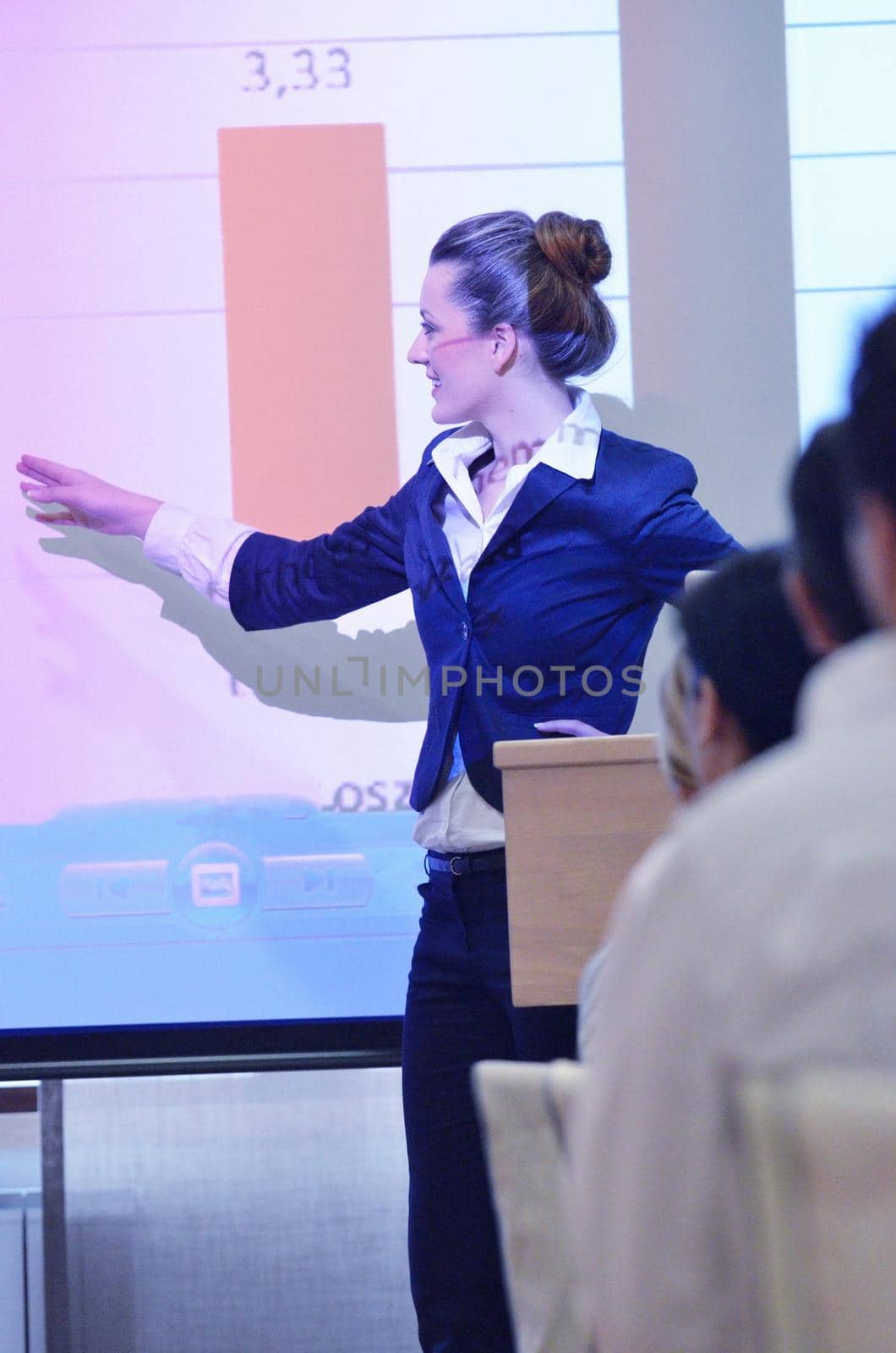 business woman giving presentation by dotshock