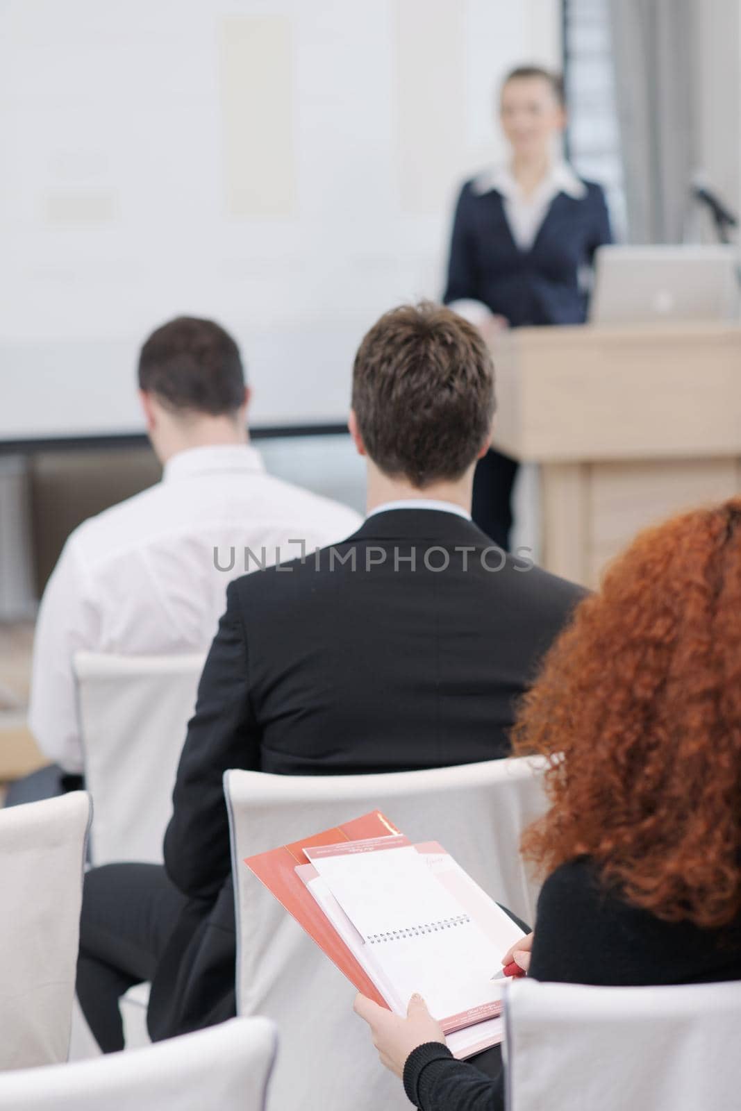 business woman giving presentation by dotshock