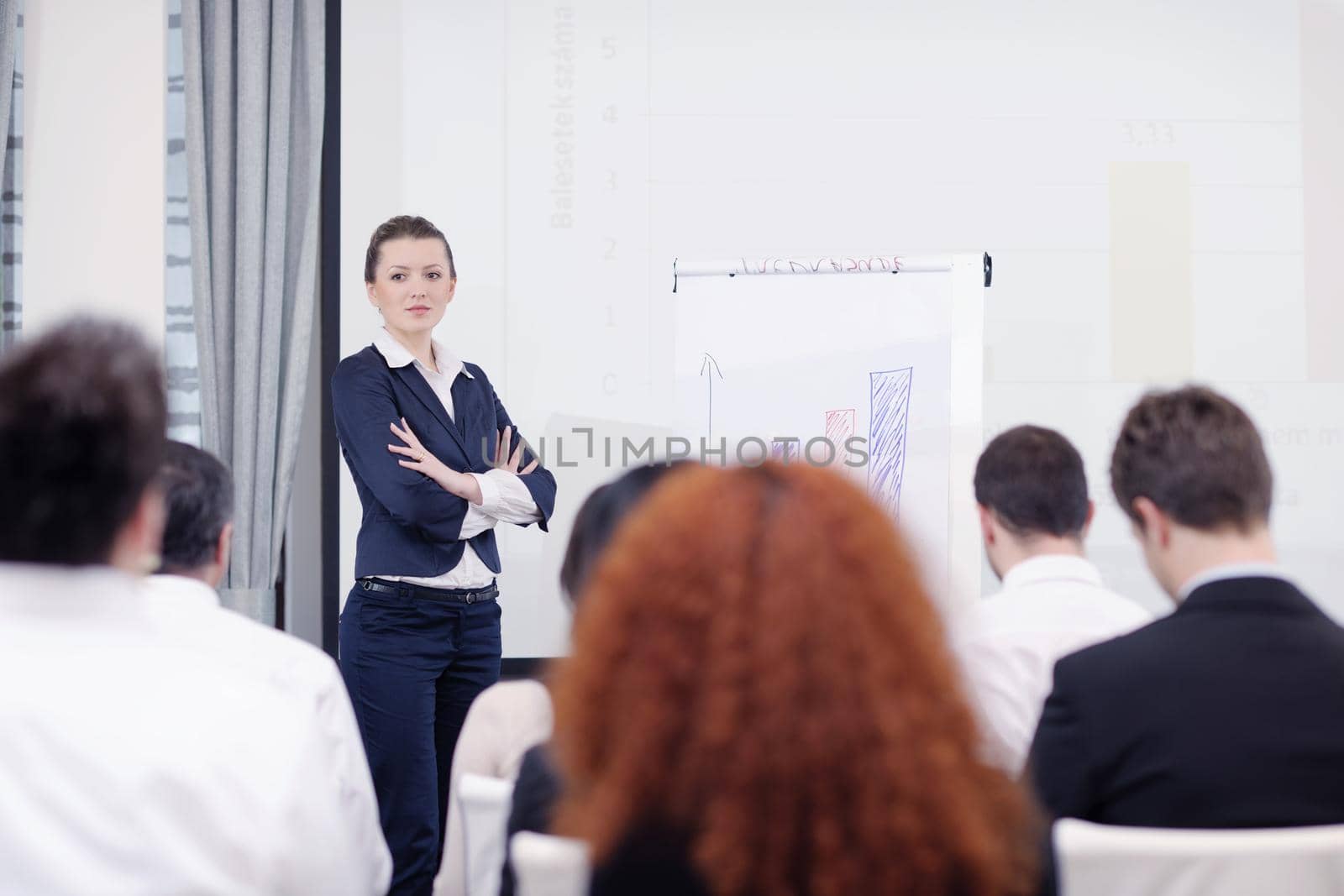 business people group at meeting seminar presentation in brigt conference room