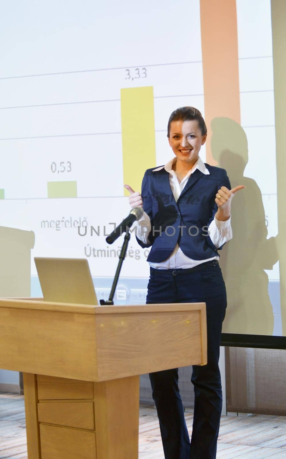 business woman giving presentation by dotshock