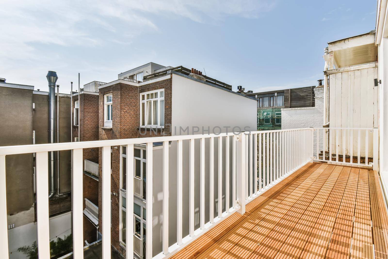 Long cozy balcony in a luxury house