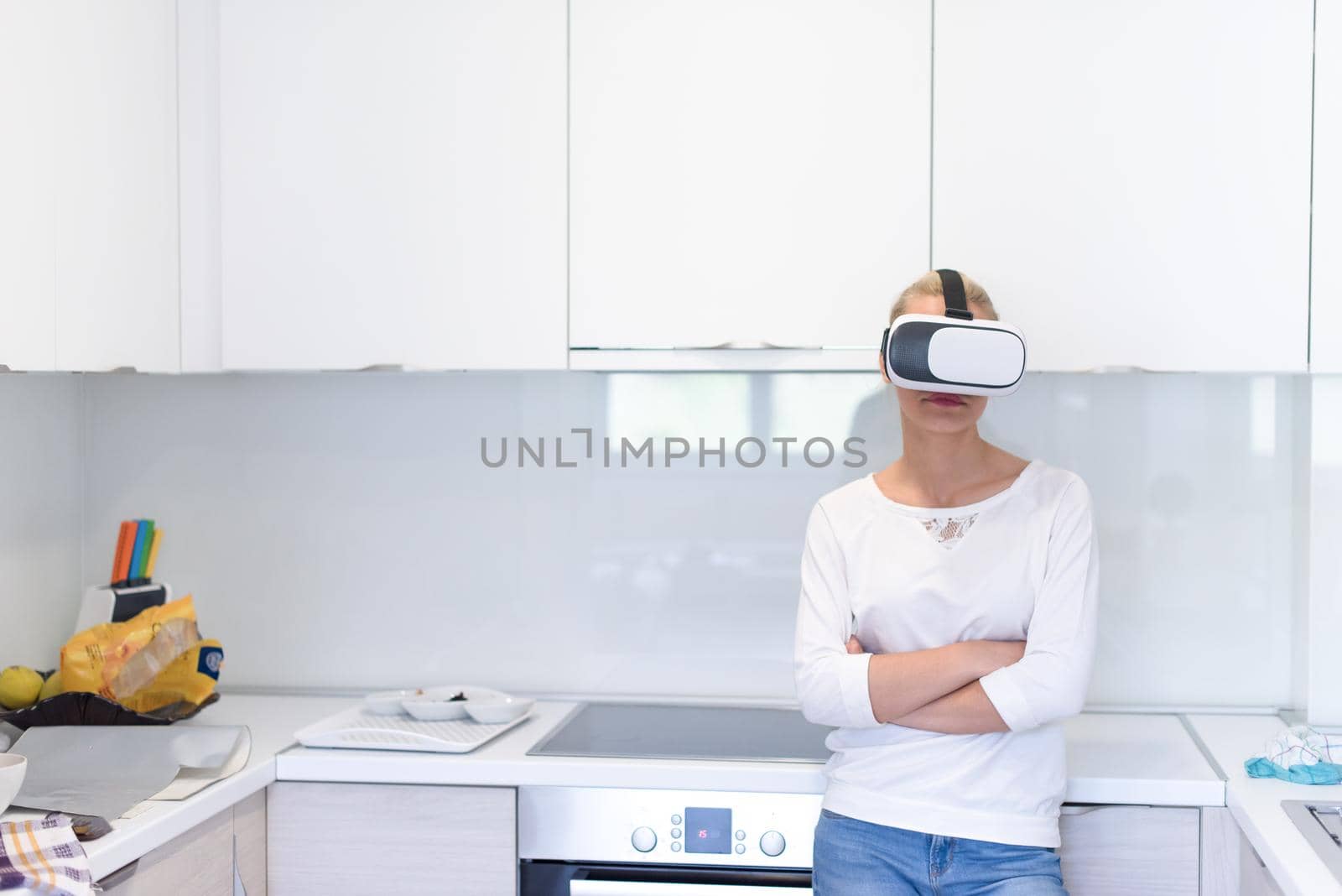 woman using VR-headset glasses of virtual reality by dotshock