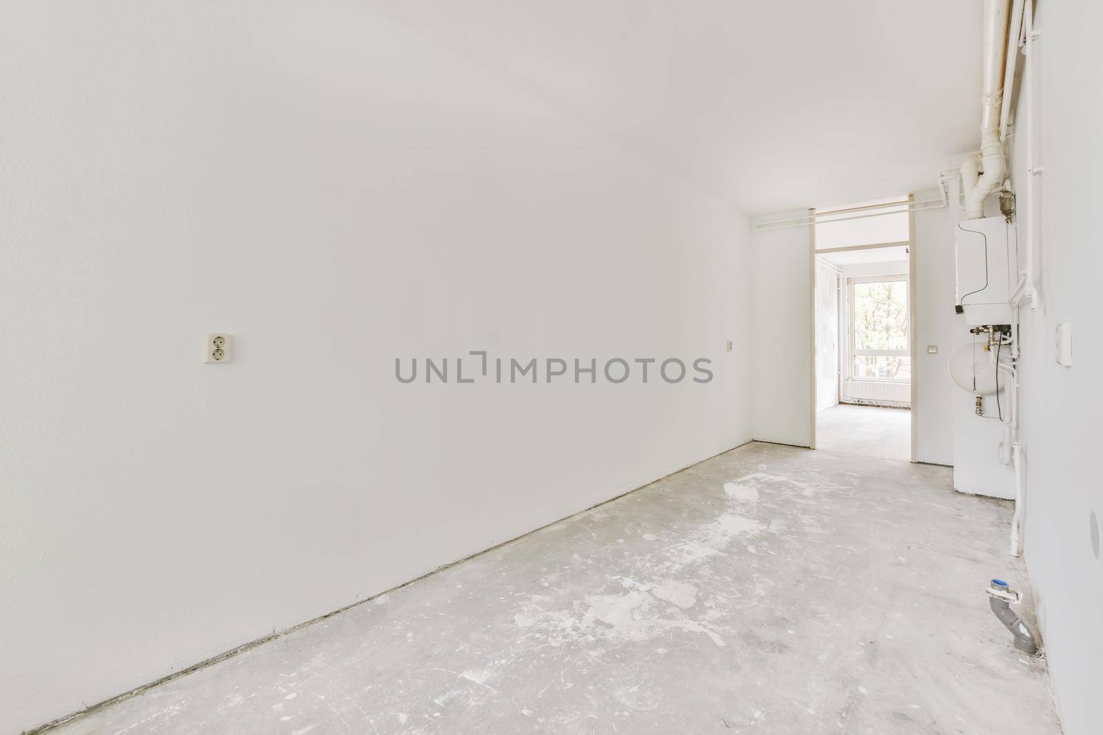 A long empty corridor designed in minimalistic style