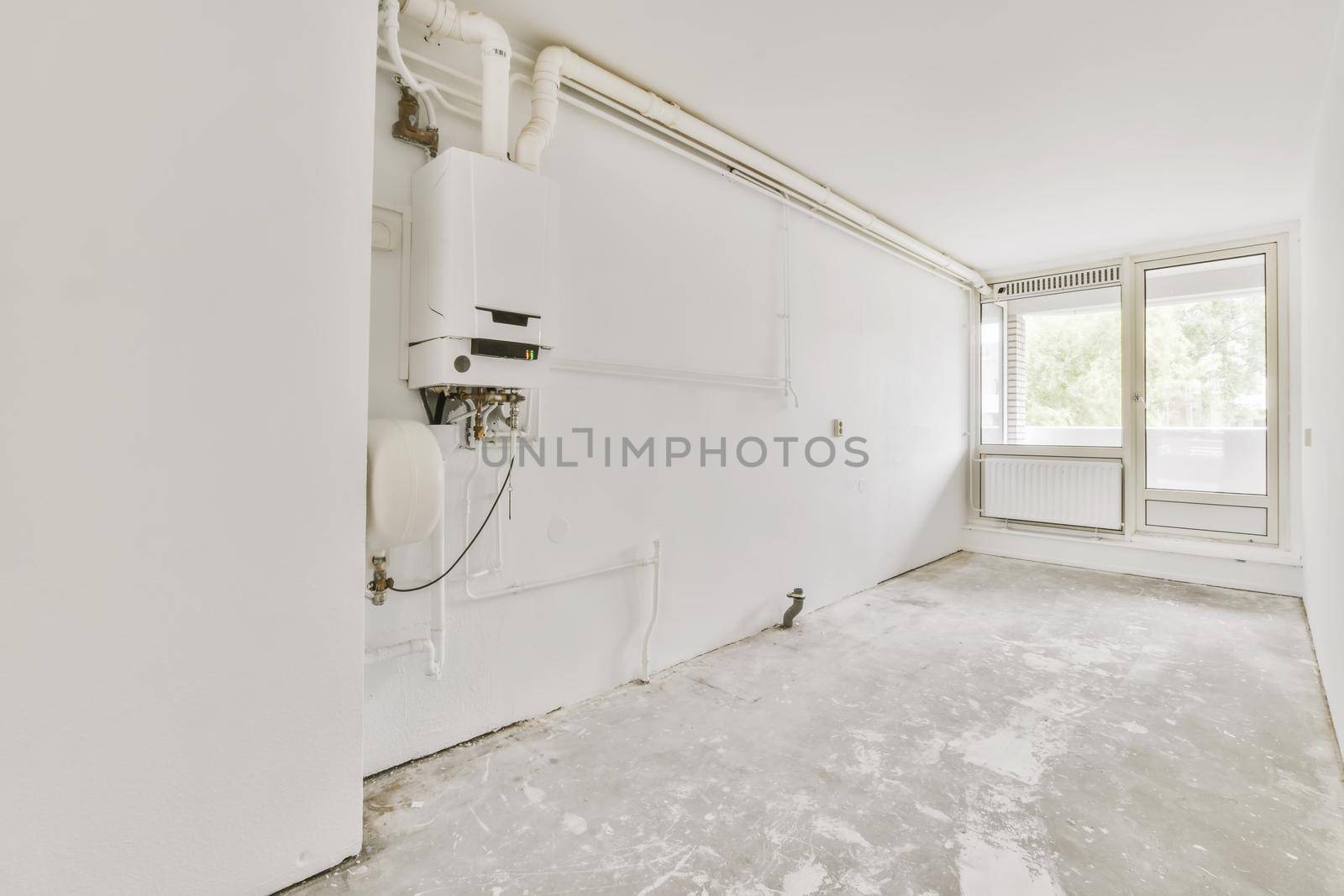 Interior design of a bright room with large windows