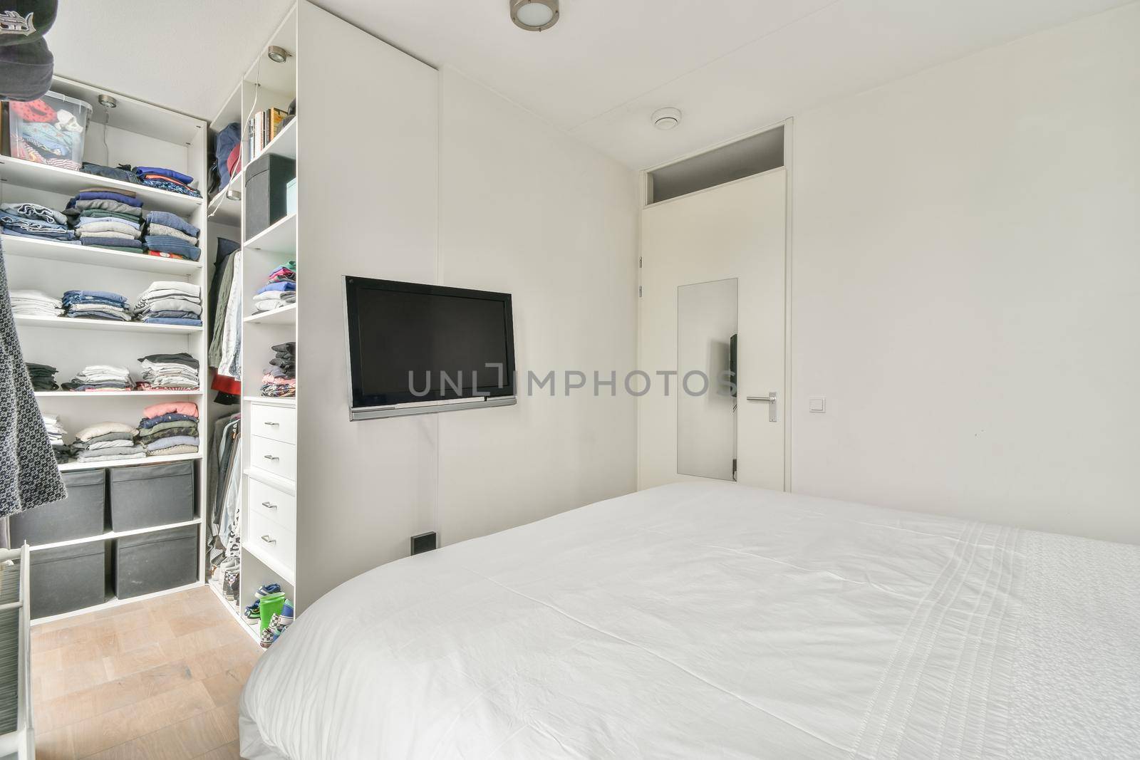 Stylish interior of contemporary room with comfortable bed