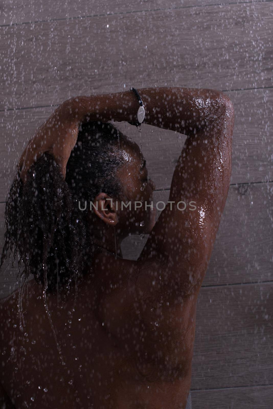 African American woman in the shower by dotshock
