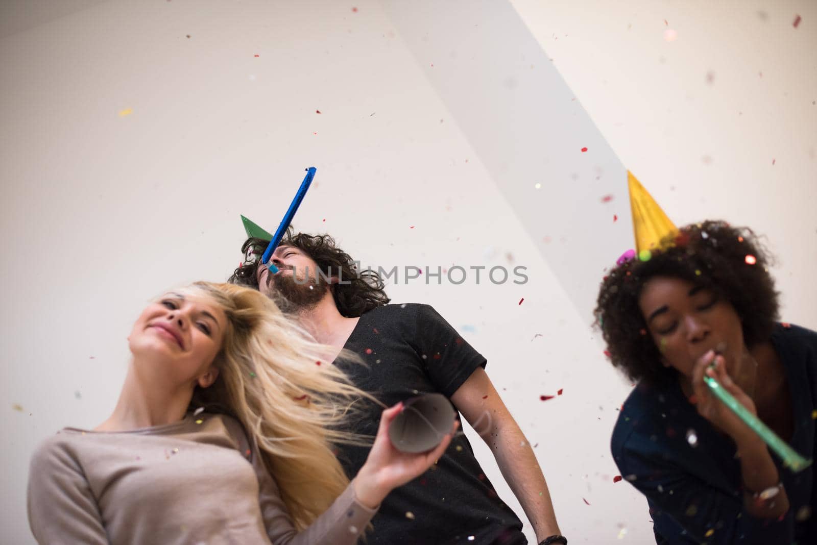 confetti party multiethnic group of people by dotshock