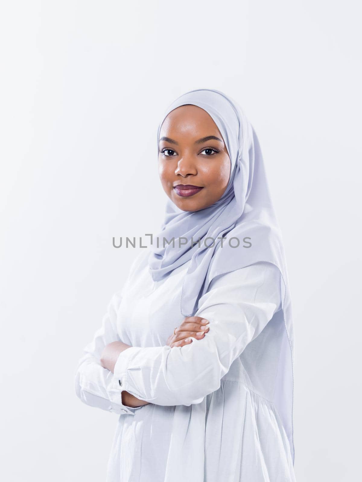 portrait of young modern muslim afro beauty wearing traditional islamic clothes on white background